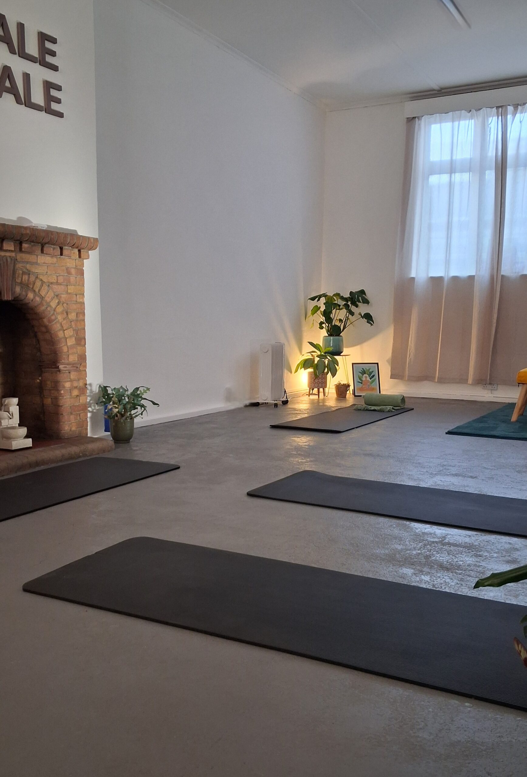 The Menopause Wellbeing Studio set up with mats for a session